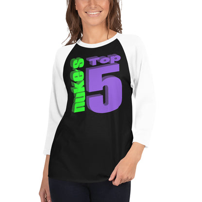 A woman wearing a Nuke's Top 5 logo black and white baseball tee