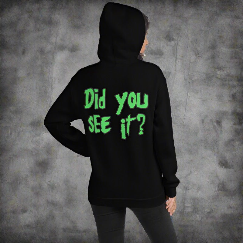 A person wearing a two-sided black hoodie with the text "Did you SEE it?" in green on the back, reminiscent of Nuke's Top 5.