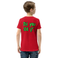 Child wearing red t shirt with Nuke's Top 5 logo on front and "Did you see it" on the back